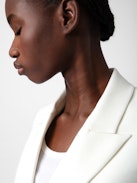 Visit Peace & Love Diamanté Blazer - White blazer with pointed collar, button closure and diamanté “Peace Love” wings motif on the back.
