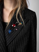 Valdo Blazer - Black straight-cut oversized blazer with pinstripes and customised badges designed by Humberto Cruz.