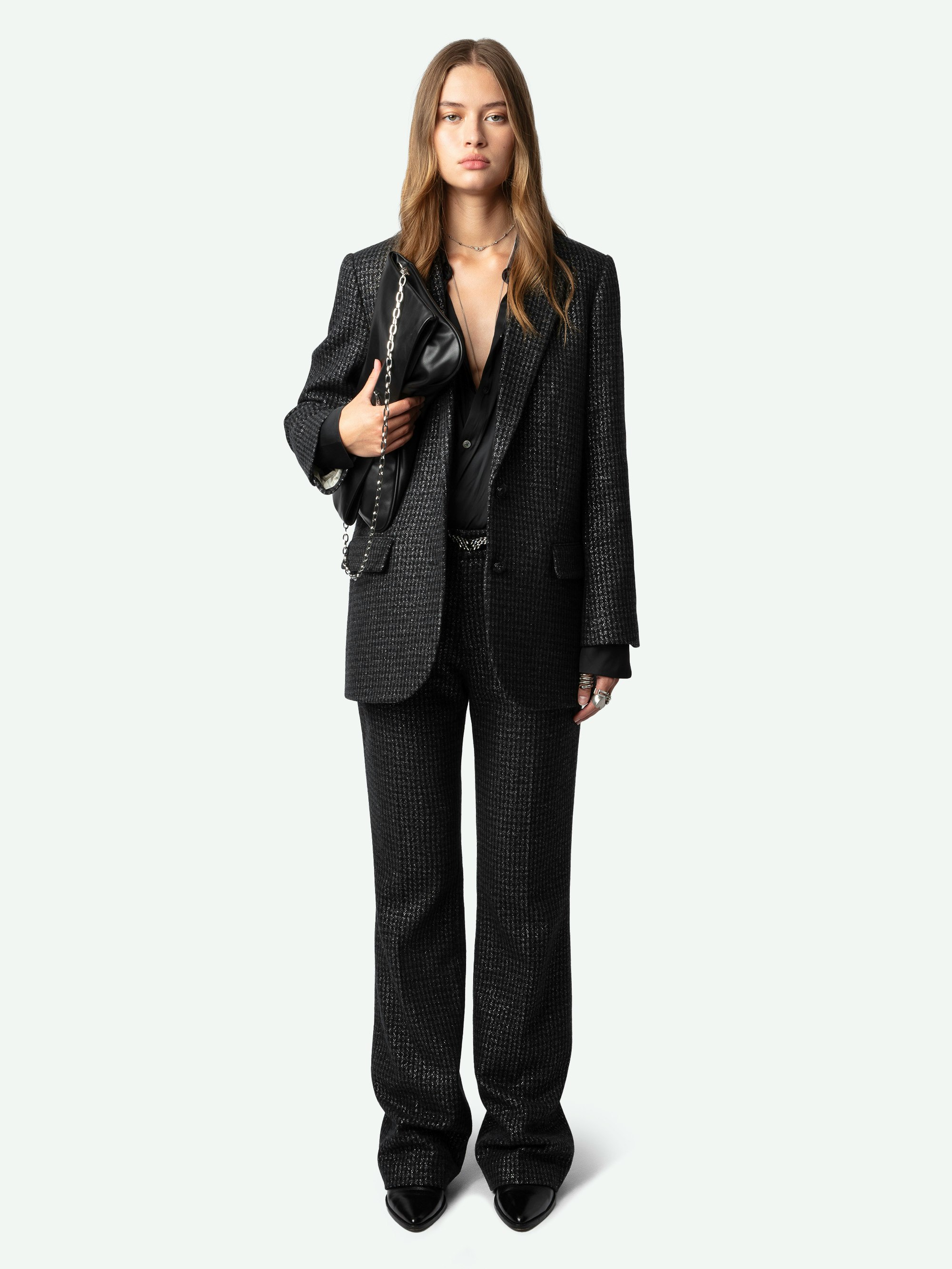 Viva Blazer - Black blazer with metallic mottled checks, button fastening and pockets.