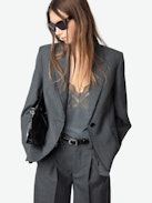 Vavy Blazer - Structured blazer in cold wool blend with raw-edge finish and button fastening.