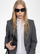 Vavy Blazer - Structured straight-cut tailored blazer with skull rhinestones and button fastening.