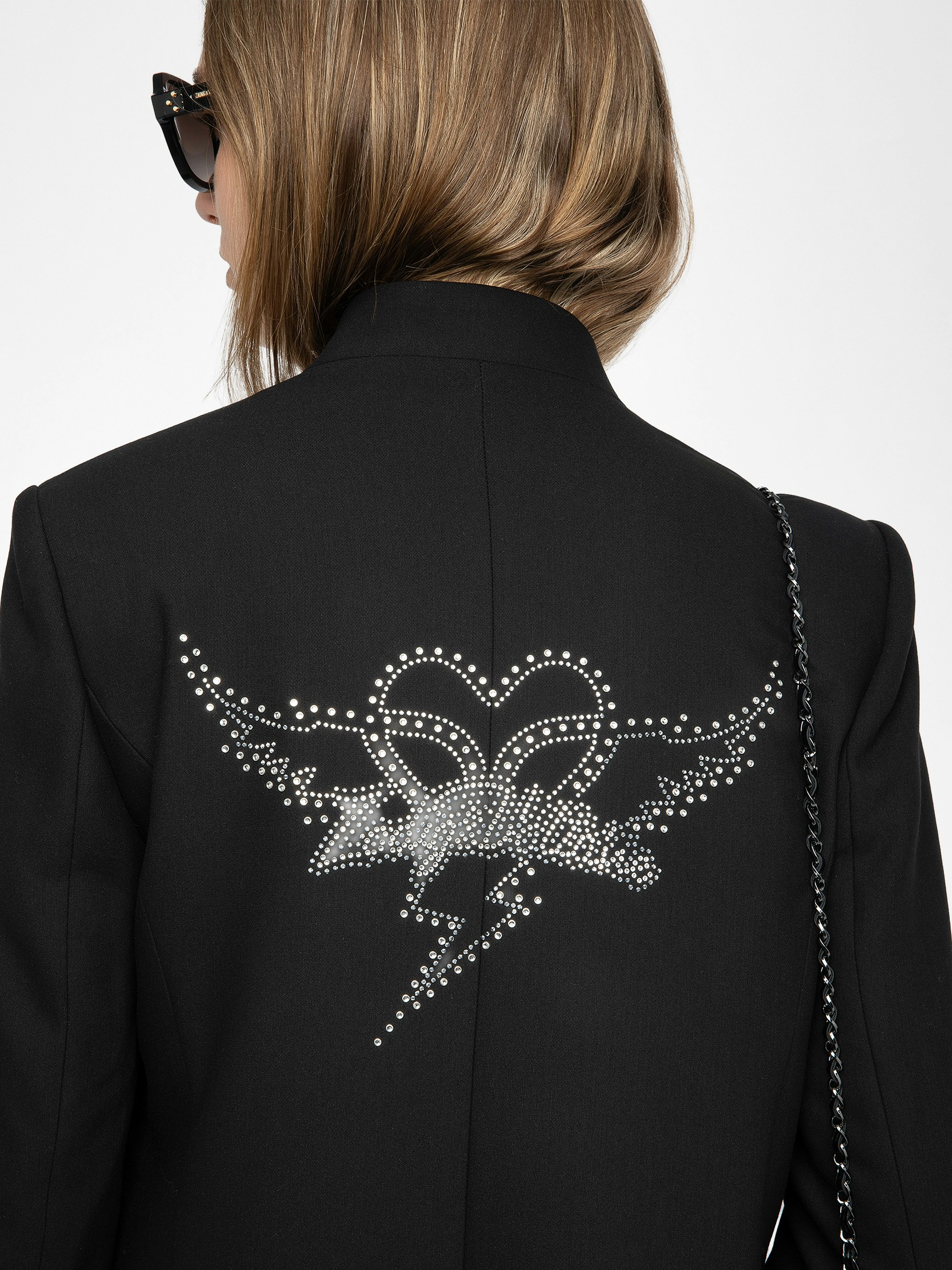 Verysa Blazer - Structured straight blazer, high collar, rhinestone back details, removable flap, and button fastening.