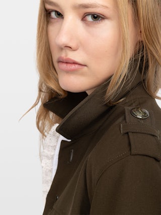 Veraman Blazer - Military-inspired tailored blazer with button closure and multiple pockets.