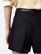 Pink Shorts - Black tailored shorts with pockets.