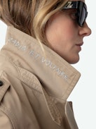 Mandy Trench Coat - Long brown water-repellent button-up trench coat with removable belt decorated with links and signature wings.