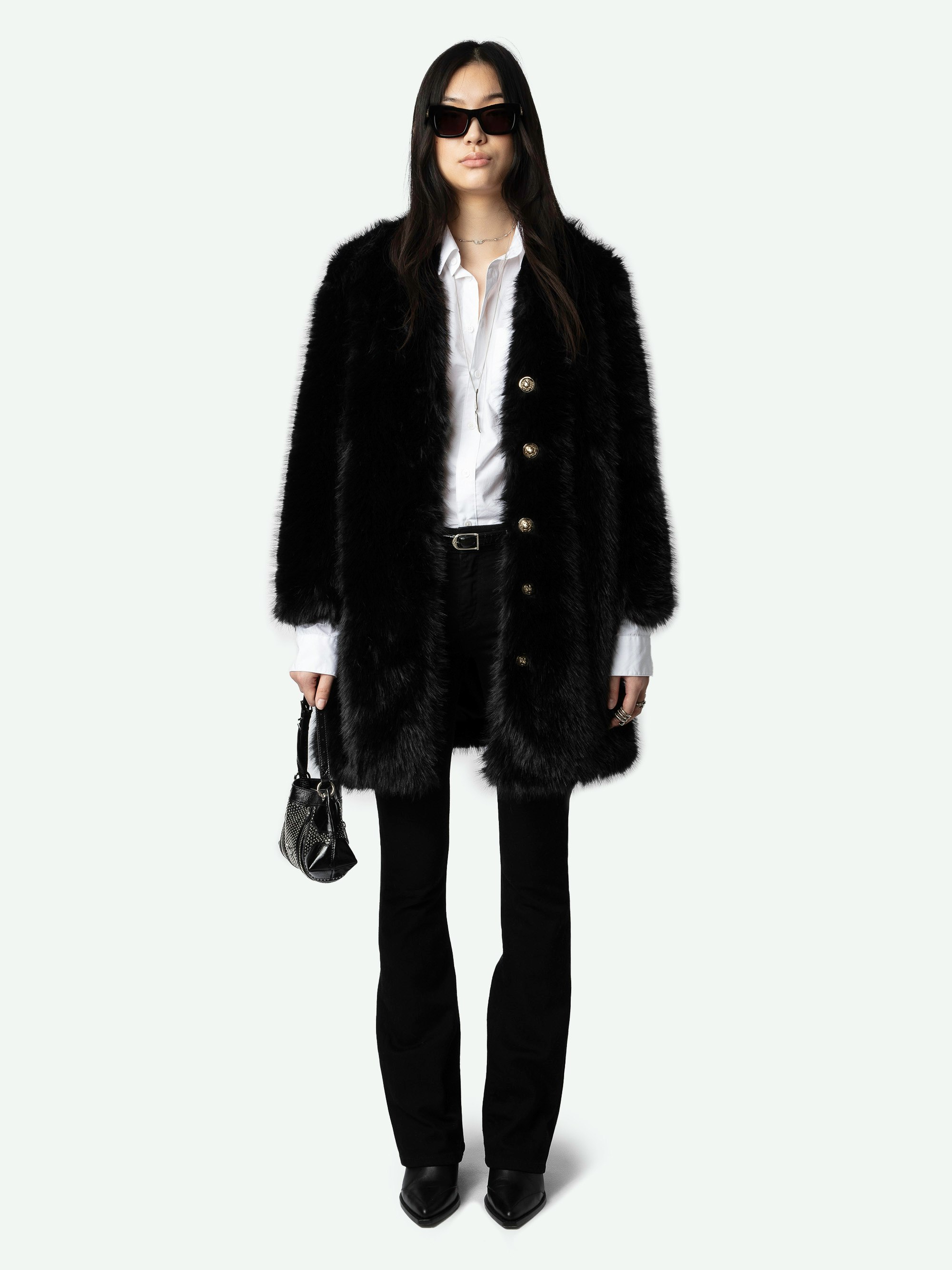 Milas Coat - Mid-length faux fur coat in black with button fastening and pockets.
