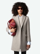 Marco Coat - Brown mid-length coat with button fastening and pockets.