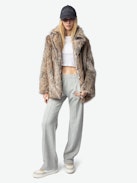 Faune Coat - Short faux fur coat with button fastening.