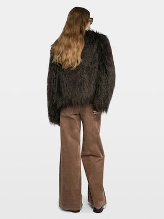 Freddie Curly Faux Fur Coat - Coat in curly faux fur with long sleeves.