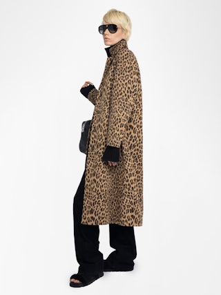Mentle Coat - Cotton canvas coat with leopard print, long sleeves, button closure and front pockets.