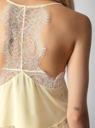 Claudy Silk Camisole - Light yellow silk camisole with thin straps and lace trim.