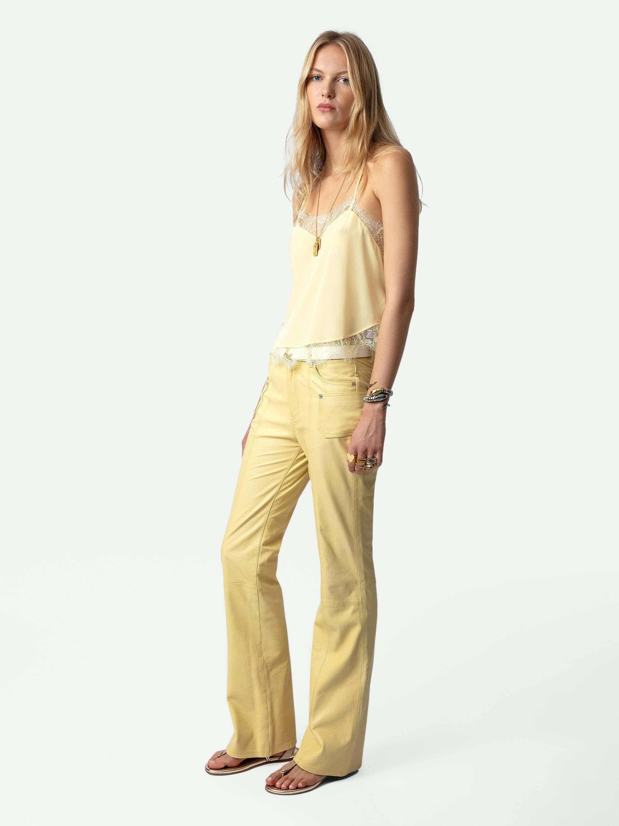Claudy Silk Camisole - Light yellow silk camisole with thin straps and lace trim.
