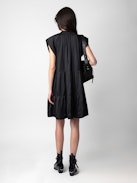 Rito Satin Dress - Add timeless elegance to your wardrobe with this women’s black satin tiered dress, designed with a flattering ruffled skirt and soft satin fabric. Featuring short cap sleeves and a tie at the neck, this dress combines romantic charm with modern sophistication. Perfect for evening events or special occasions, it’s a versatile piece that exudes effortless style.