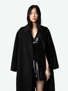 Rashu Sequin Dress - Black sequin mini dress with plunging V neckline and short sleeves.