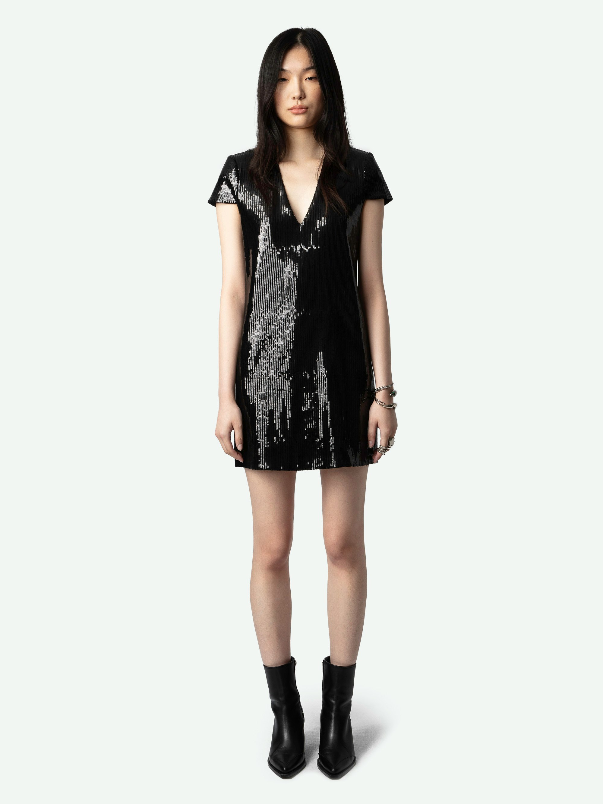 Rashu Sequin Dress - Black sequin mini dress with plunging V neckline and short sleeves.