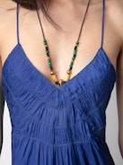 Rayonna Satin Dress - Lingerie-style blue satin mini dress with straps and an elaborate front.