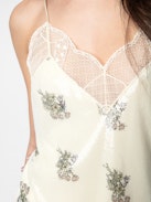 Kleid Ristyl Pailletten - Langes, ecrufarbenes Kleid im Lingerie-Stil mit Blumenprint, Pailletten, Trägern und Spitzenbordüre.