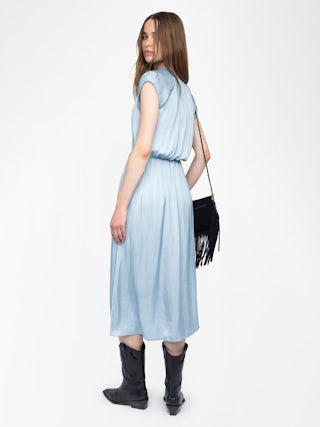 Randall Asymmetric Ruffled Dress​ - Mid-length satin dress with short raglan sleeves and an asymmetric ruffled panel skirt.