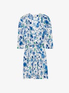 Ruz Dress - Ecru crepe mini dress with Garden Flowers floral print, gathers and crossover neckline.