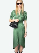 Rimaz Satin Dress - Asymmetrical green dress in Japanese satin with short sleeves, wrap skirt, and buttoned neckline.