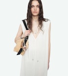 Rimati Kleid - Langes Kleid aus Baumwollgaze, Ausschnitt vorne und hinten, ärmellos und Kordeln mit Flügeln.