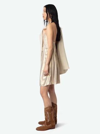 Rayonna Pleated Satin Dress - This lingerie-inspired mini dress is crafted from luxurious satin, featuring delicate pleats that enhance its fluid silhouette. The adjustable cross-over straps ensure a personalized fit, while the rich gold hue adds a touch of opulence.