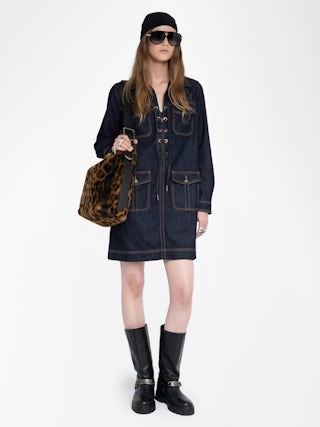 Remacha Denim Dress - Short dress in raw denim, long sleeves, applied military-style pockets and deep laced neckline.