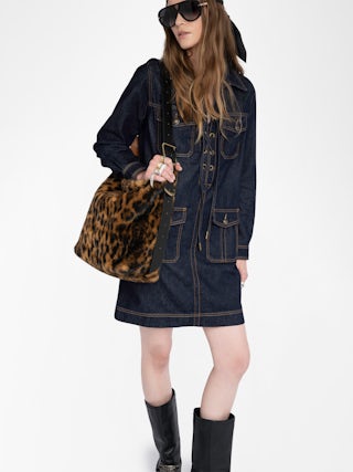 Remacha Denim Dress - Short dress in raw denim, long sleeves, applied military-style pockets and deep laced neckline.