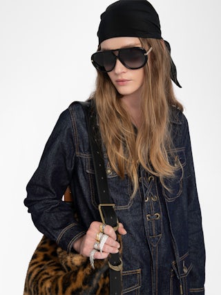 Remacha Denim Dress - Short dress in raw denim, long sleeves, applied military-style pockets and deep laced neckline.