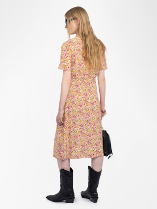 Rhodral Kleid - Midikleid aus bedruckter Viskose, kurze Ärmel, V-Ausschnitt und Metallflügel am vorderen Ausschnitt.