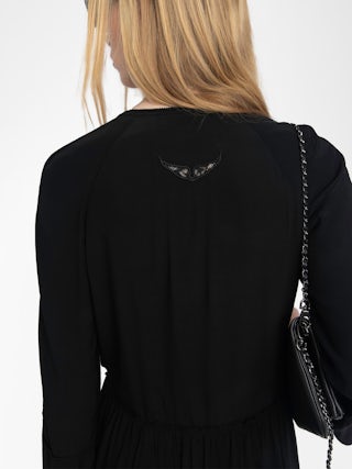 Rinas Dress - Mid-length dress in plain viscose, long sleeves, deep neckline with laced closure.