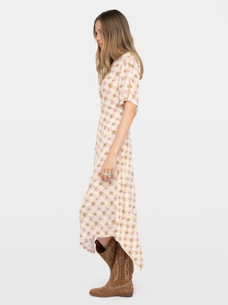 Dress Reforme - Mid-length asymmetric dress in printed viscose with short sleeves, wrap-effect.