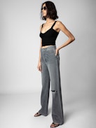 Evy Jeans - Women’s flared denim jeans with slit and embroidered “Art Is Truth” message