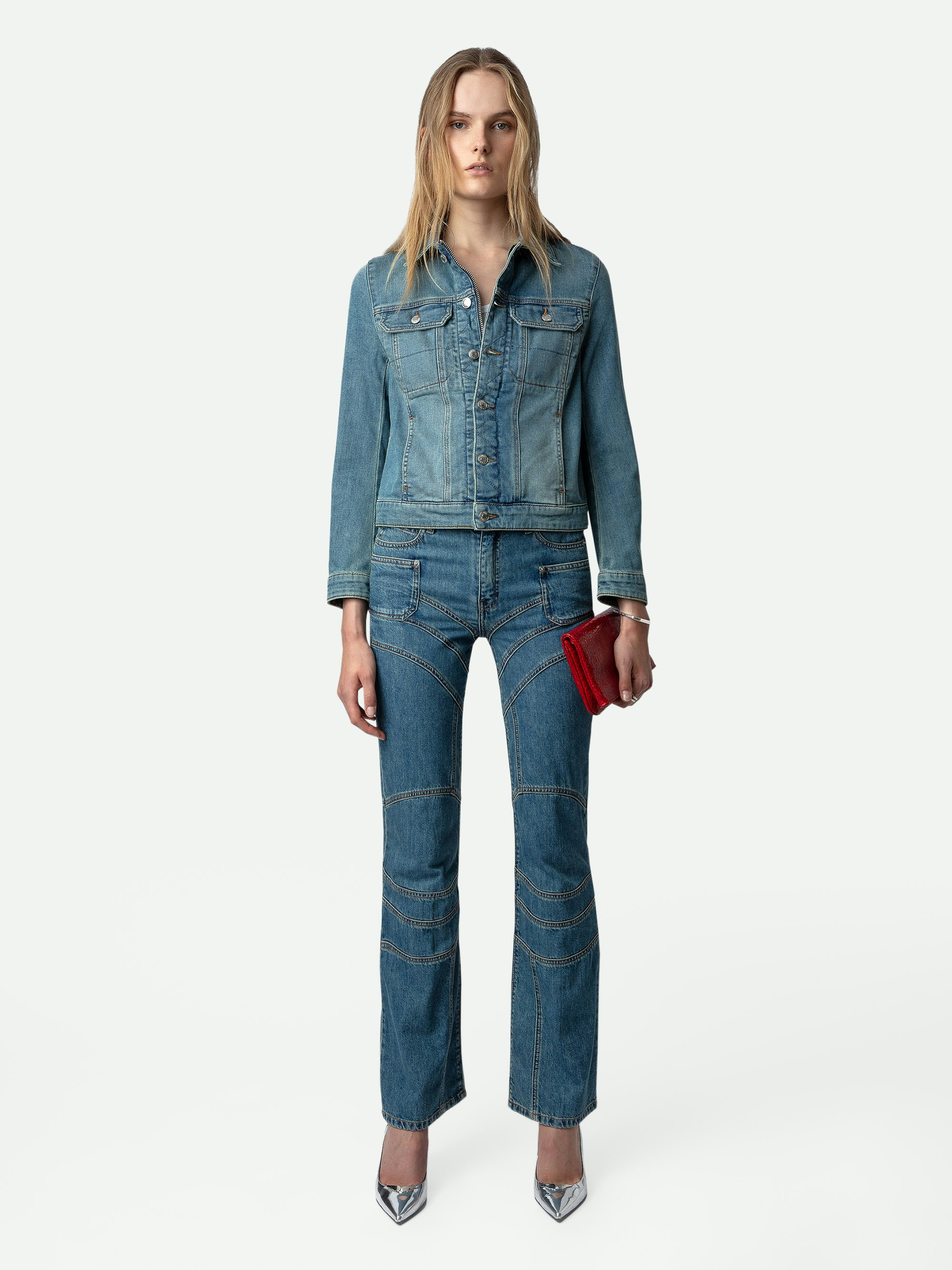 Elvira Jeans - Blue denim loose-fitting jeans with pockets and overstitched details.