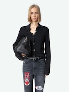 Patti Jeans - Faded black denim cropped jeans with Looney Tunes stud embellishment.