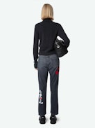 Patti Jeans - Faded black denim cropped jeans with Looney Tunes stud embellishment.
