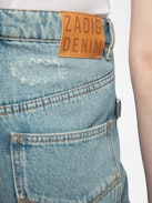 Elio Jeans - Effortless, timeless, undeniably cool. The Elio jeans channel vintage inspiration with a relaxed straight-leg fit and perfectly lived-in wash. A subtle embroidered heart adds a touch of romance to their rebellious spirit. Designed to move with you, they’re the perfect blend of comfort and rock ‘n’ roll attitude. Wear them your way—raw, rolled, or undone.