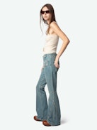 Ecume Jeans - Mid-rise bootcut jeans with braided pocket and raglan details.