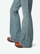 Ecume Jeans - Mid-rise bootcut jeans with braided pocket and raglan details.