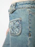 Ecume Jeans - Mid-rise bootcut jeans with braided pocket and raglan details.