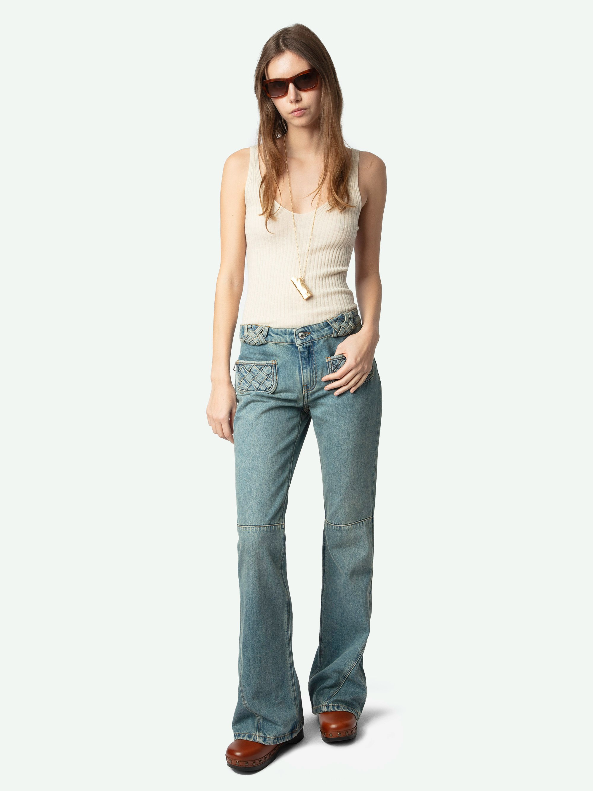 Foam Jeans - Mid-rise bootcut jeans with braided pocket and raglan details.