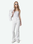 Ecume Jeans - Mid-rise bootcut jeans with braided pocket and raglan details.