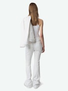 Ecume Jeans - Mid-rise bootcut jeans with braided pocket and raglan details.