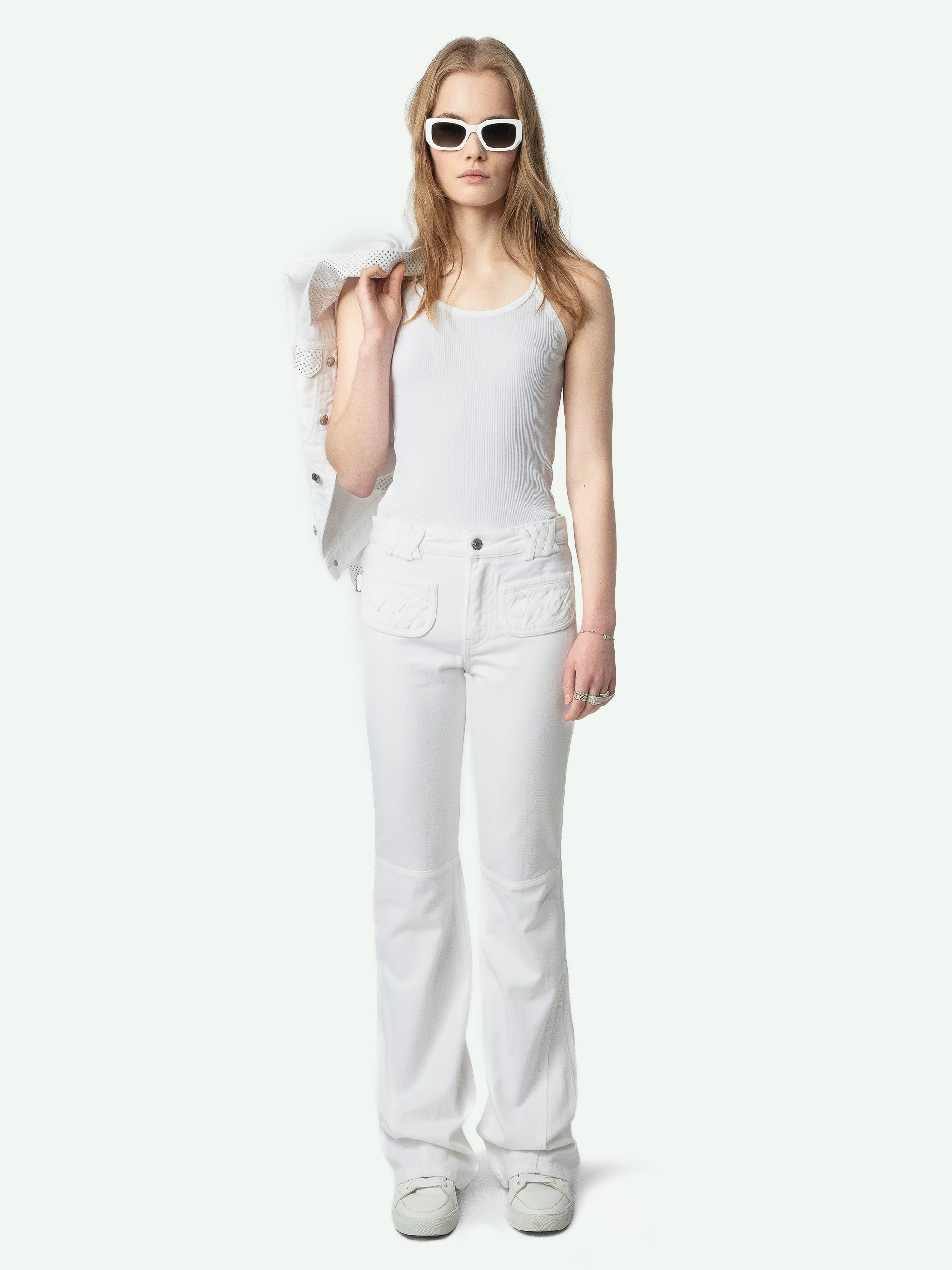 Foam Jeans - Mid-rise bootcut jeans with braided pocket and raglan details.