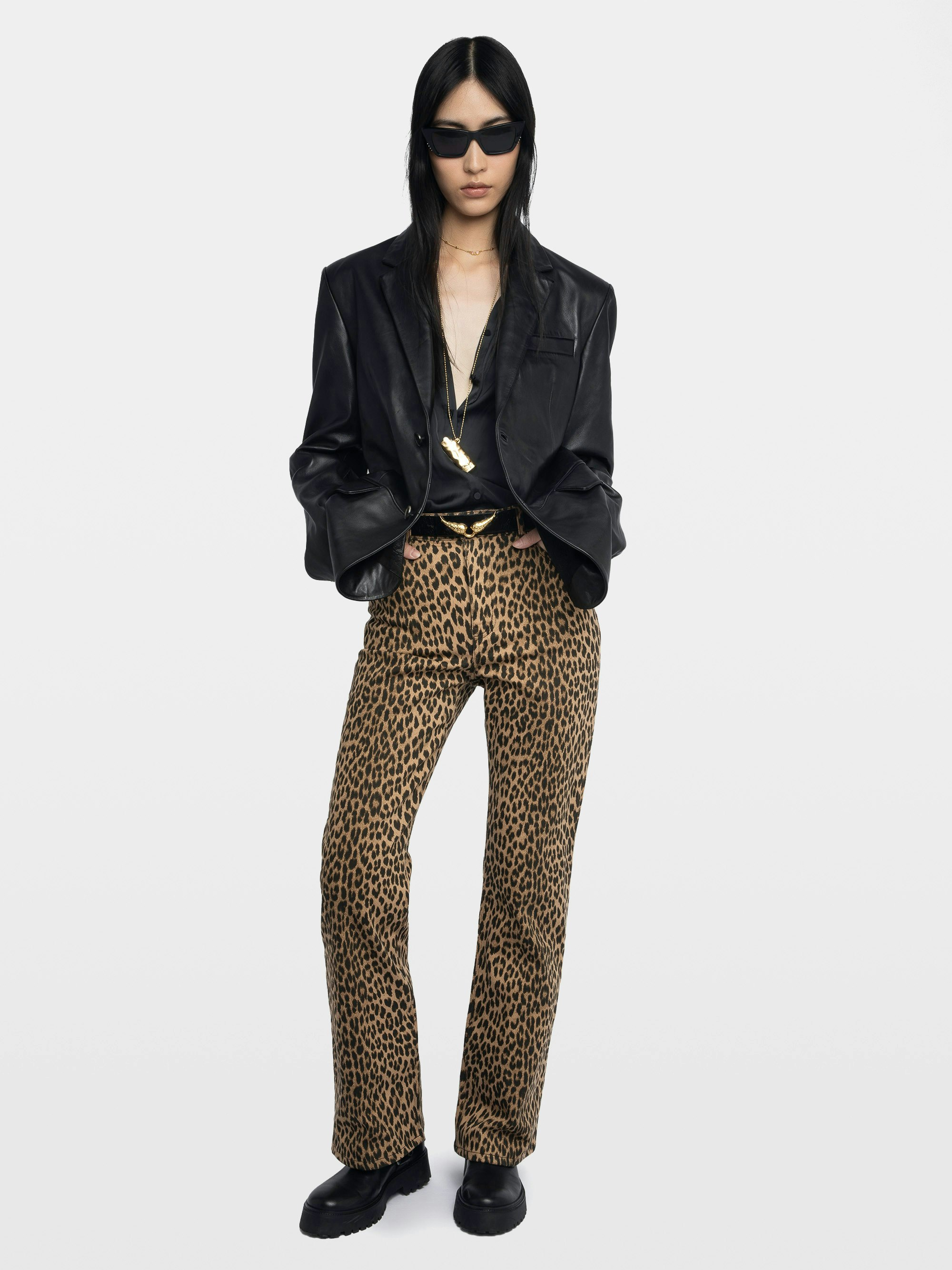 Evy Jeans - Wide-fit multi-pocket trousers in leopard print denim.