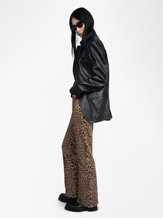 Jean Evy - Wide-fit multi-pocket trousers in leopard print denim.