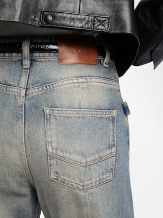 Evy Jeans - Wide-leg trousers with multiple pockets in denim.