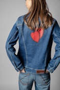 Kase Hearts Denim Jacket - Women’s denim jacket with hearts design on back.
