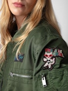 Jacke Bolid - Khakifarbene Jacke mit Reißverschluss, Taschen und Verzierungen von Humberto Cruz.