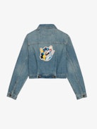 Aretha Cropped Patches Jacket - Women's medium wash cropped denim jacket with Warner Bros. patch on back.